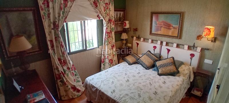 Foto b7c7dbbf-f3e8-4a83-bced-fc0451bed68e. Reihenhaus mit kamin pool in marina de Casares Casares