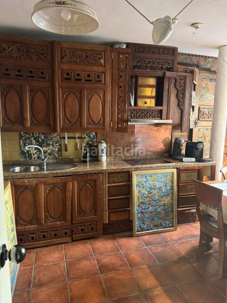 Foto d7bee883-713c-453f-b7c8-9684a8477c0b. Reihenhaus mit kamin pool in marina de Casares Casares