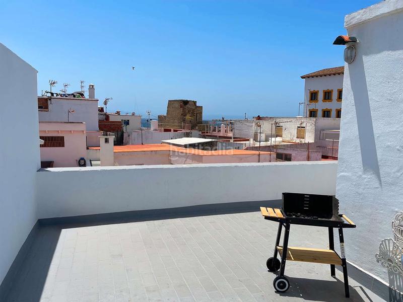Foto a9b3cffe-5149-419b-8c61-ec5ef116c493. Apartamento se vende casa en el casco antiguo con pequeño patio en Tarifa