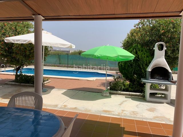Foto d66094c7-581a-4deb-90b0-b3b8c58c39cb. Xalet amb xemeneia aparcament piscina a Carlota (La)