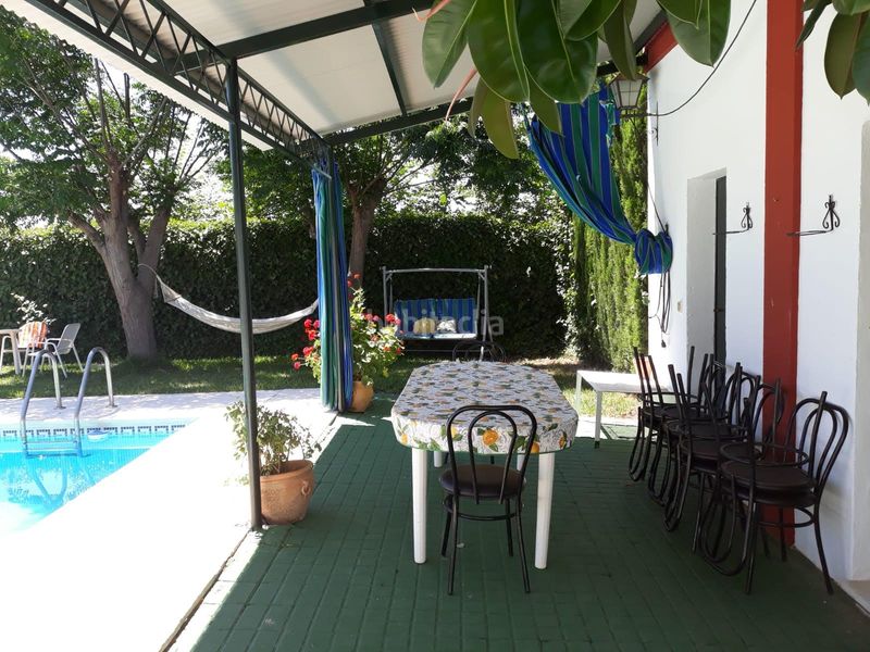 Foto cfe744cc-48d5-4a69-ab8b-ad054b9230b2. Xalet amb xemeneia aparcament piscina a Carlota (La)