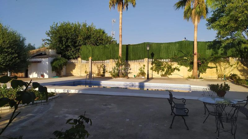 Foto fbb6c0e3-d437-4ac0-b20c-32c4383c1a9b. Xalet amb xemeneia aparcament piscina a Carlota (La)