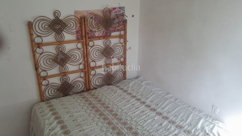 Foto da994be8-5a1d-435a-8cde-c6ee5866cd44. Casa adossada amb xemeneia calefacció a Cájar