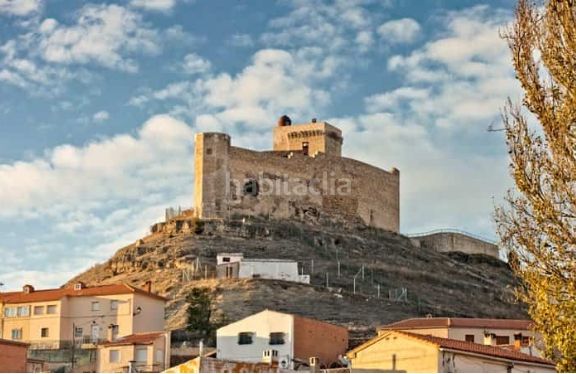 Foto e9c48f65-8400-45ad-bf75-85cb3ea2ebc3. House with fireplace in Cañada del Hoyo