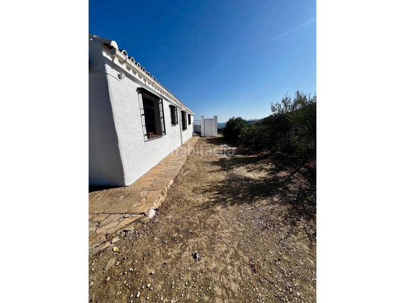 Foto 11318b1f-0ac8-4f15-a020-ab04cbbe55f4. Casa amb aparcament piscina a Viñuela
