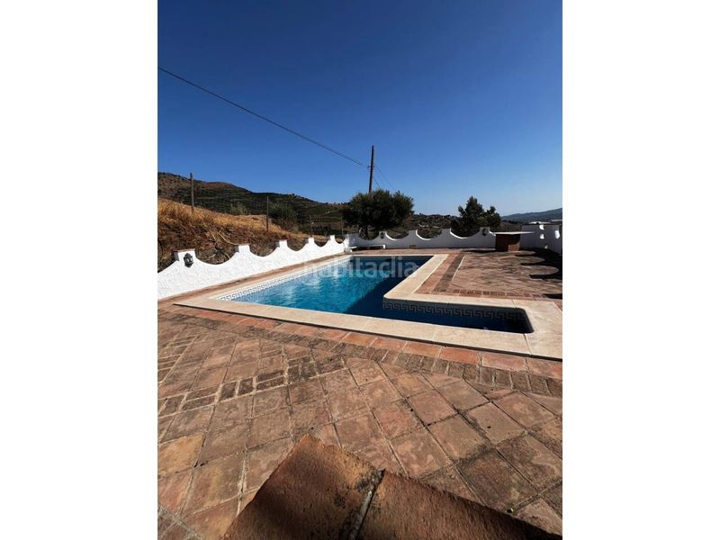 Foto 4a396c56-2f57-47f1-b993-fe6d36f1fefb. Casa amb aparcament piscina a Viñuela