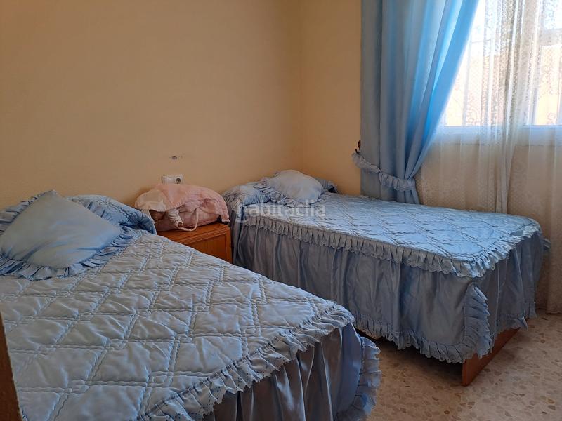 Foto 32797364-e550-4a43-84c8-31ac95ca80e6. Casa adossada amb calefacció aparcament piscina a Dos Hermanas