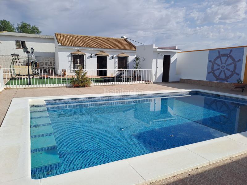 Foto ba9c579b-ac9c-4b72-956b-fb1f43f45611. Chalet parcela rustica en los palacios con parcela de 800mts y 120 mts construidos, la vivienda cuenta con 3 dormitorios, salón-comedor en Palacios y Villafranca (Los)