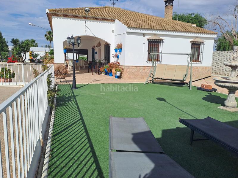 Foto c5af6b2d-79d7-4a09-9fcd-55887adc914a. Chalet parcela rustica en los palacios con parcela de 800mts y 120 mts construidos, la vivienda cuenta con 3 dormitorios, salón-comedor en Palacios y Villafranca (Los)