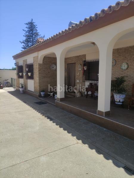 Foto 1ce61d1c-05f4-4bb4-b430-23a8ec7ed12d. Chalet avec chauffage parking piscine dans La Paz Alcalá de Guadaira