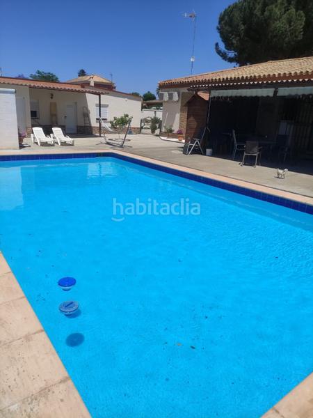 Foto 72cfd7c4-5413-46dd-bae4-14501b978d82. Chalet avec chauffage parking piscine dans La Paz Alcalá de Guadaira