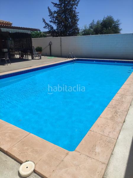 Foto 530c95a2-7c14-4115-80b7-2996d17e1104. Chalet con riscaldamento parcheggio piscina in La Paz Alcalá de Guadaira