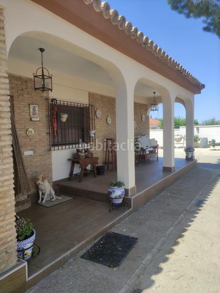 Foto 918130ef-d77e-44fb-b0e9-6348ece61f61. Chalet con riscaldamento parcheggio piscina in La Paz Alcalá de Guadaira