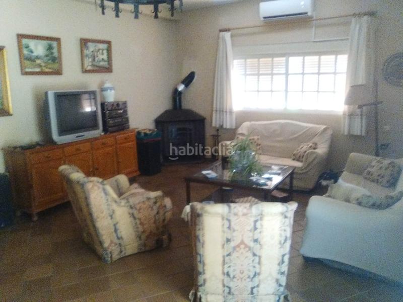 Foto 0beb2c97-5f0f-446d-829a-252fdcdf02ae. Chalet mit kamin parking pool in La Paz Alcalá de Guadaira