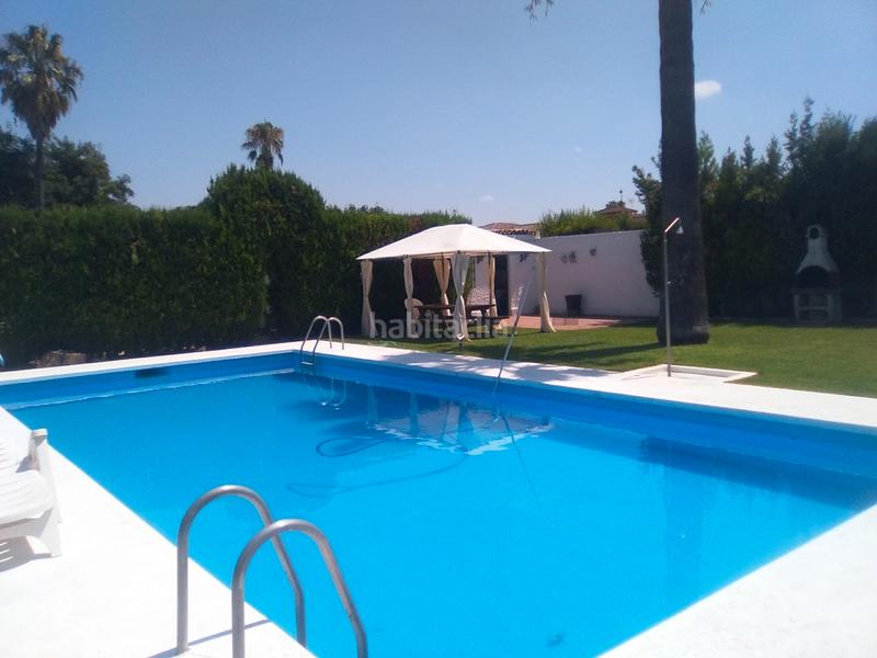 Foto 2dcc0b44-6487-4bad-b6ad-666f712e9455. Chalet mit kamin parking pool in La Paz Alcalá de Guadaira