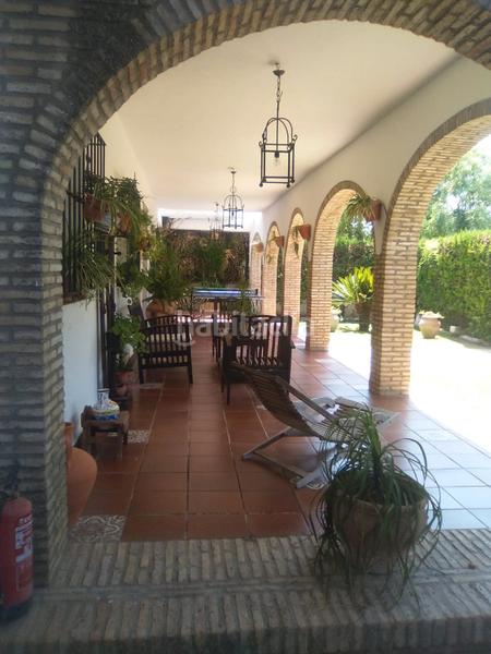 Foto 46ebf56a-bf0a-41c8-b664-0dbec7f14404. Chalet mit kamin parking pool in La Paz Alcalá de Guadaira