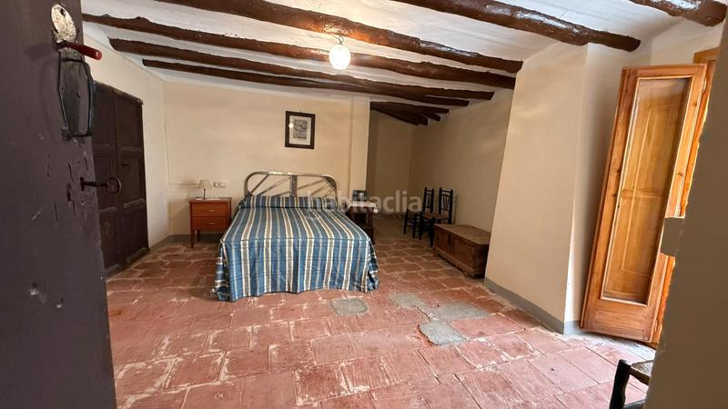Foto e6885a7d-8e38-42d3-8ca3-036e9f4d6c34. Casa adosada casa en venta en ortells en Morella