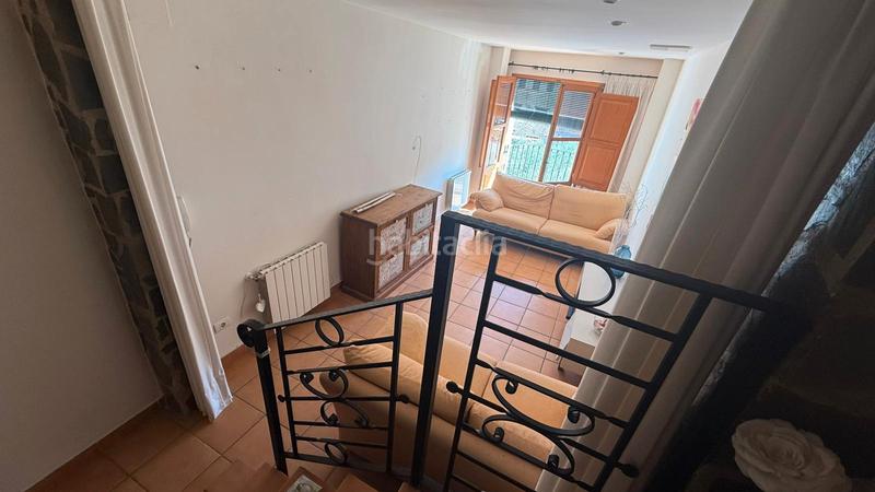 Foto d555907d-1167-4941-aeed-9bd27954b8e4. Casa adossada a Ayódar