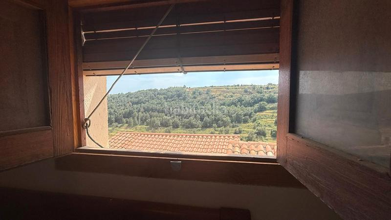 Foto 79eb76b8-fac1-45a6-bace-329e4051559f. Casa aparellada amb xemeneia a Villafranca del Cid