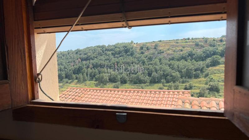 Foto 8c39e0bb-509f-498f-aea0-30f6acbc4c40. Casa aparellada amb xemeneia a Villafranca del Cid