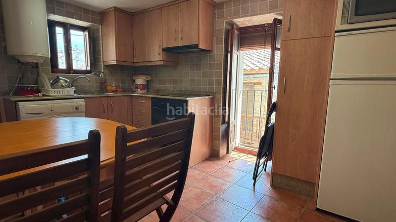 Foto 902c4f6f-b468-4784-a085-d52dcda07669. Casa aparellada amb xemeneia a Villafranca del Cid