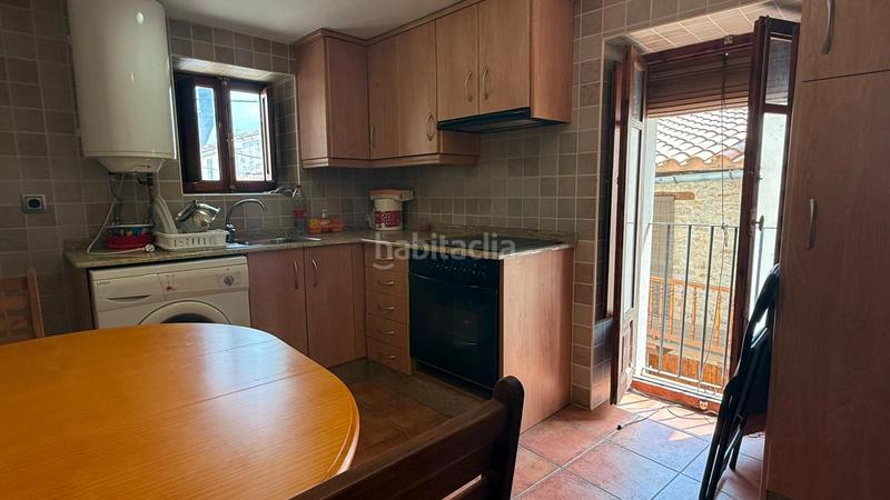 Foto e995d6da-78b1-4545-90ad-5bb01ae65b6a. Casa aparellada amb xemeneia a Villafranca del Cid