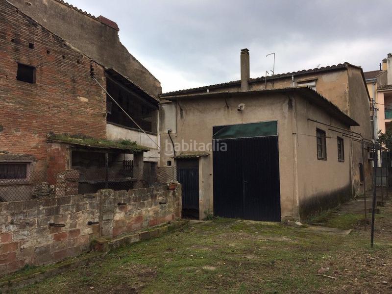 Foto a4ac047f-e8eb-44ef-a498-5265add36bff. Casa  de pueblo con gran jardín en Anglès