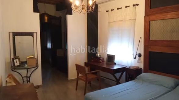 Foto 55b3f1a2-e369-479d-81be-1d76aaf0f22b. Casa adossada amb xemeneia a Orihuela ciudad Orihuela