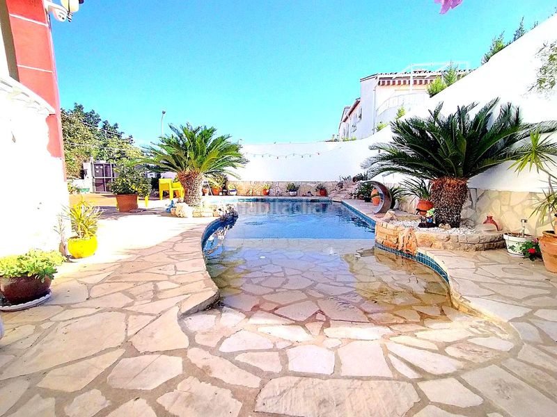 Foto 56cd72eb-52a8-4cf9-8065-15e3bbddee11. Casa amb piscina a Oliva pueblo Oliva