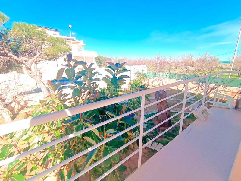 Foto 5c1f3410-1290-42f8-8044-0cb5e8fd6ec6. Casa amb aparcament a Oliva playa Oliva