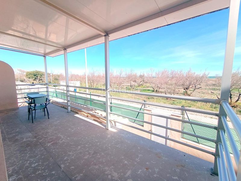 Foto b31effd4-9b9f-44b3-b6d6-931a22bb0db5. Casa amb aparcament a Oliva playa Oliva