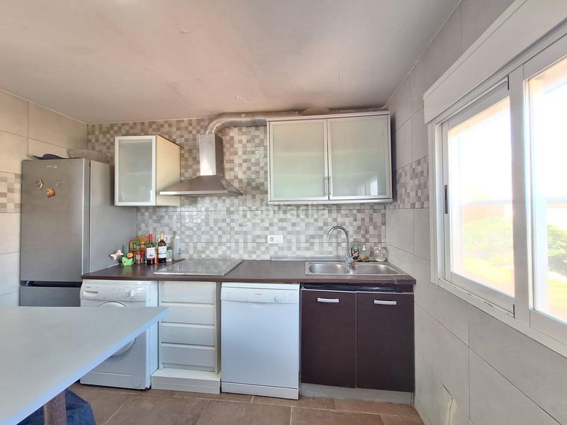 Foto 78c25fb5-3696-403f-8dcf-652872c7f723. Casa adossada amb aparcament a Mareny de Barraquetes Sueca