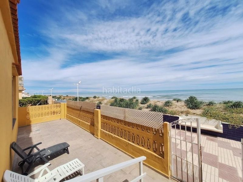 Foto 8c6b2b6a-af28-4849-a299-2e93b79582a5. Casa adossada amb aparcament a Mareny de Barraquetes Sueca