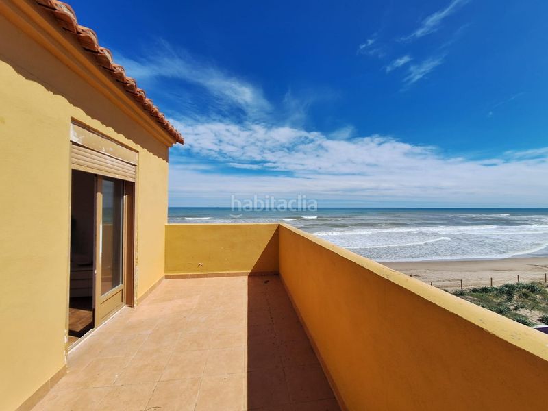 Foto c05efae6-4914-46ee-a20e-01b2e6951739. Casa adossada amb aparcament a Mareny de Barraquetes Sueca