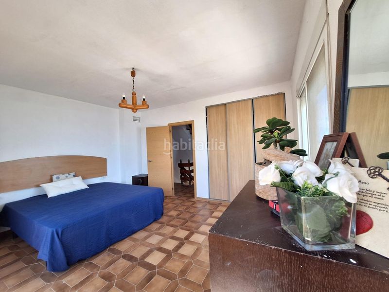 Foto cd83116f-267b-42b2-a6cf-c77a347fe2df. Casa adossada amb aparcament a Mareny de Barraquetes Sueca