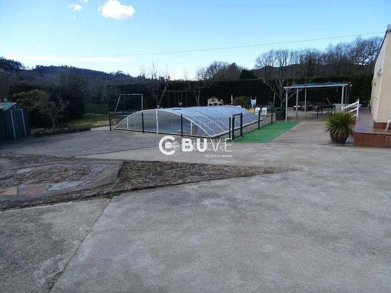 Foto ebd9b3c6-a29f-4965-a254-c2684abd1df3. Xalet amb calefacció piscina a Cotobade