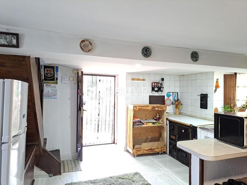 Foto 1a9e13e1-a261-4d46-afbe-6f4db98bb1f9. Casa adosada casa con jardín en venta en Grado