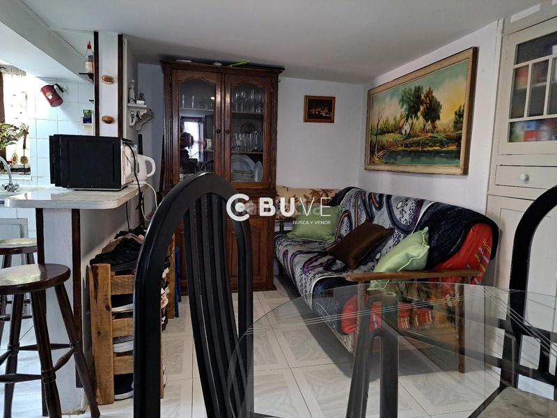 Foto a6ed8b61-f3b4-4fcc-99f5-9b432921e66e. Casa adosada casa con jardín en venta en Grado