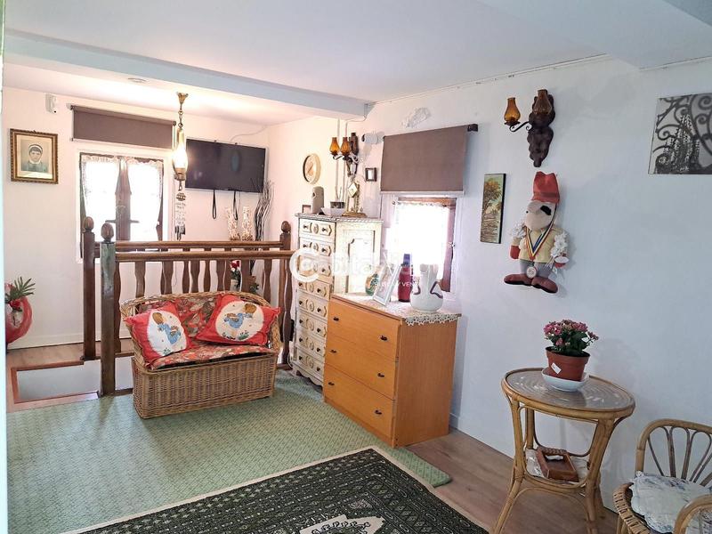 Foto e2ebf25b-95cf-4007-87ad-5545081c40c4. Casa adosada casa con jardín en venta en Grado