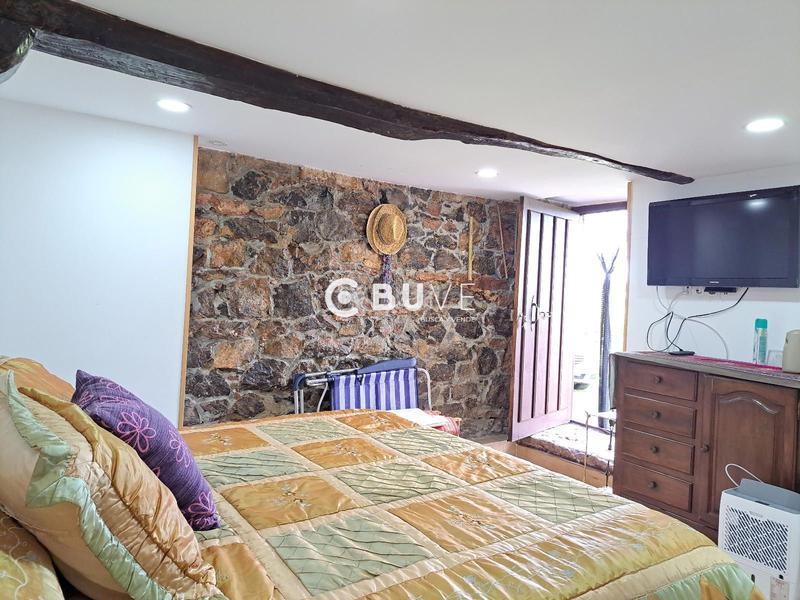 Foto fd7e5590-1088-4571-9aa6-97860a6049f2. Casa adosada casa con jardín en venta en Grado