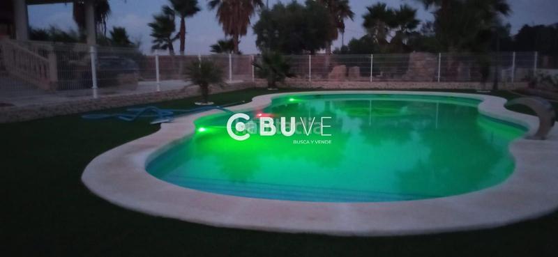 Foto bfb9b6d8-f73c-419d-b251-cbf8de0d2c20. Chalet casa con terreno y piscina en venta, 4 habitaciones, 3 baños uno junto piscina. en Cox