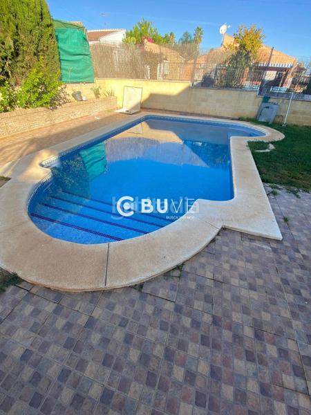 Foto 7e4cb562-9366-4e48-b788-23d1c3a134c7. Casa con parcheggio piscina in Bollullos de la Mitación