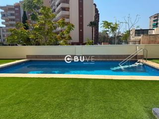 Pis  Valldigna. Piso en segunda línea de playa con garaje y piscina.