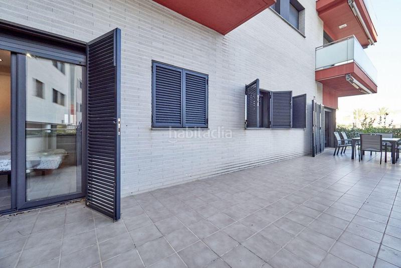 Foto ddc69f4a-10a9-4cc8-9881-9cfb471ab39c. Planta baja  con terraza playa en Els Munts Torredembarra
