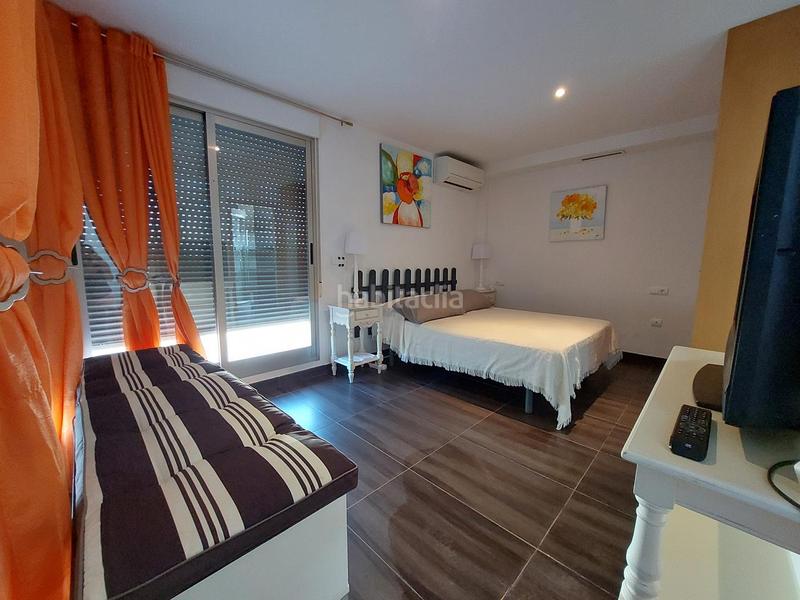 Foto 001e70d1-78d0-42c4-a3f5-26e8718ec478. Rent semi detached house with heating pool in Oliva playa Oliva
