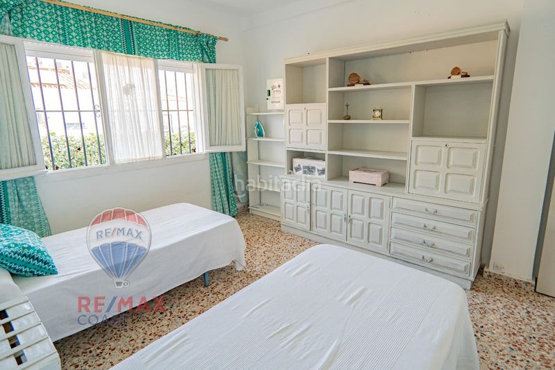 Foto 478682a5-408a-4a6e-89af-84a18943e15e. Casa aparellada a Miraflores del Palo Málaga