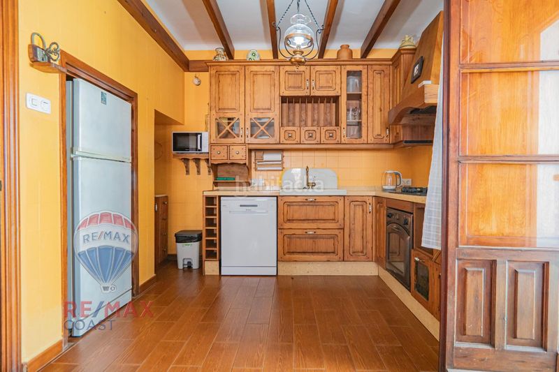 Foto d97c07a7-4a65-49c3-84af-6c58f49f2ad7. Casa aparellada a Miraflores del Palo Málaga