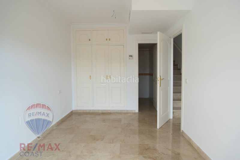 Foto 0c370742-16eb-4d35-9e65-dfcc91283a0a. Casa aparellada amb aparcament piscina a Mijas golf Mijas