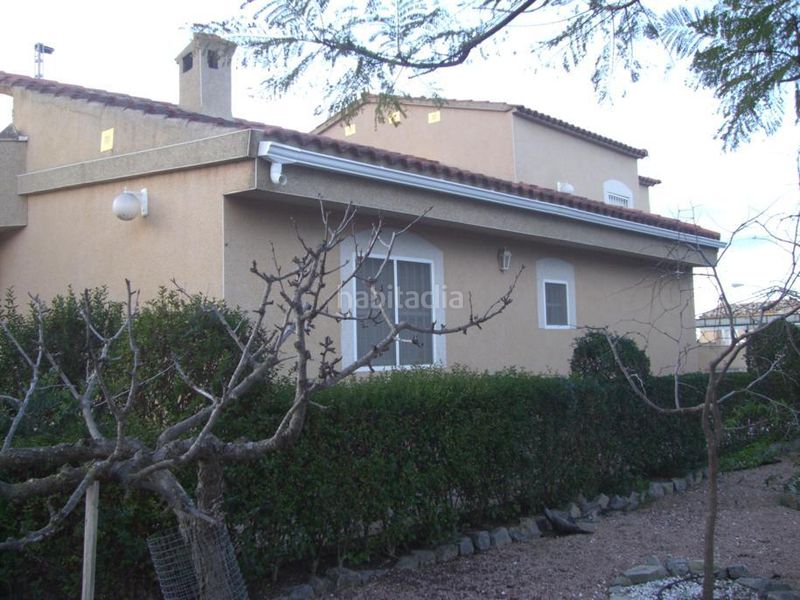 Foto 5e8e4b41-5a5a-495d-a9cb-1f2ce451fe6e. Chalet avec parking dans El Secanet-Hacienda del Sol Vila Joiosa (la)