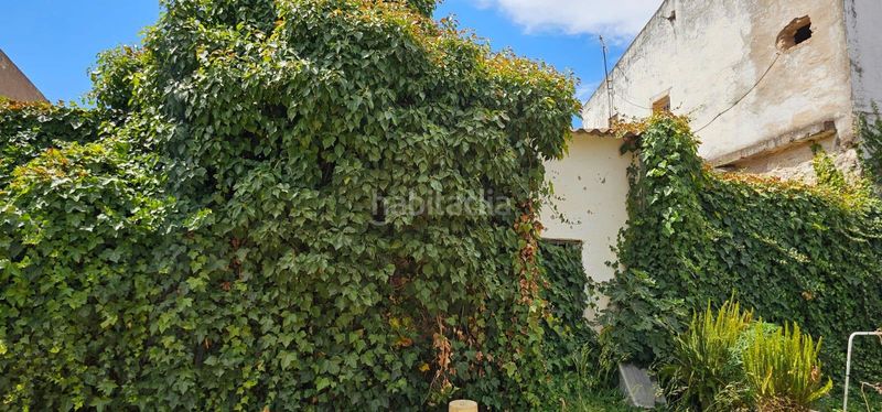 Foto 9218fa23-75b1-4369-bc0a-8708c94428d6. Casa adossada amb aparcament a Algaba (La)